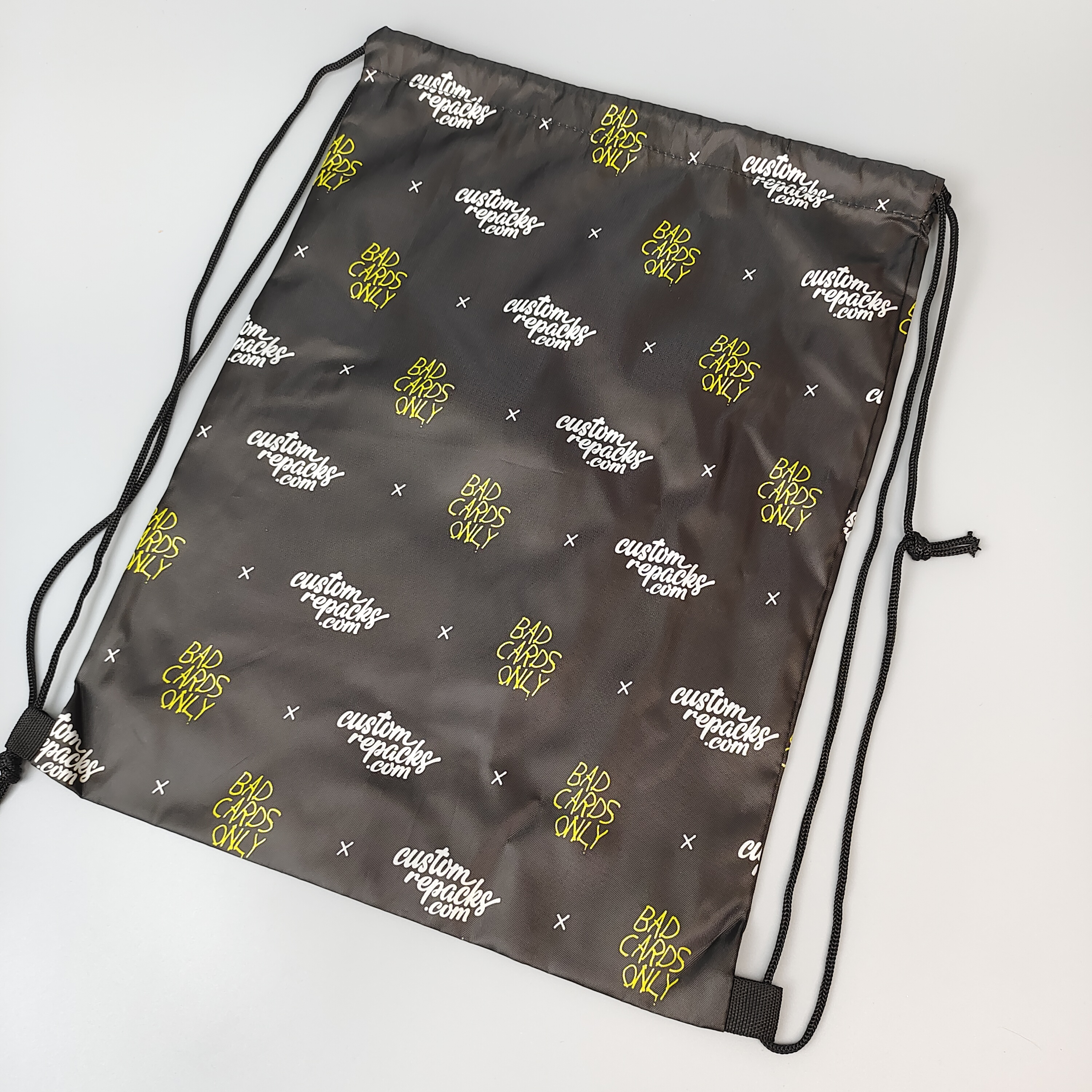 black polyester drawstring backpack with repeated all-over logo pattern - view 1