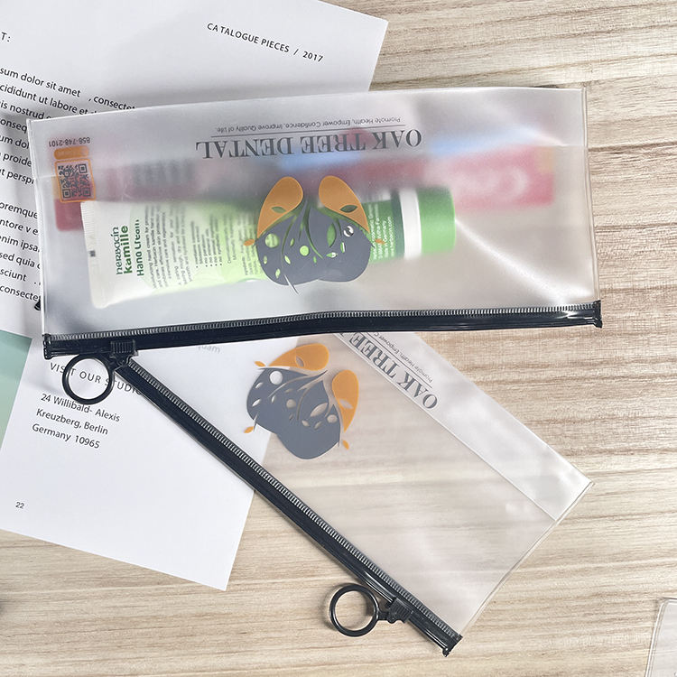 frosted dental kit PVC pouch with black zipper and ring pull