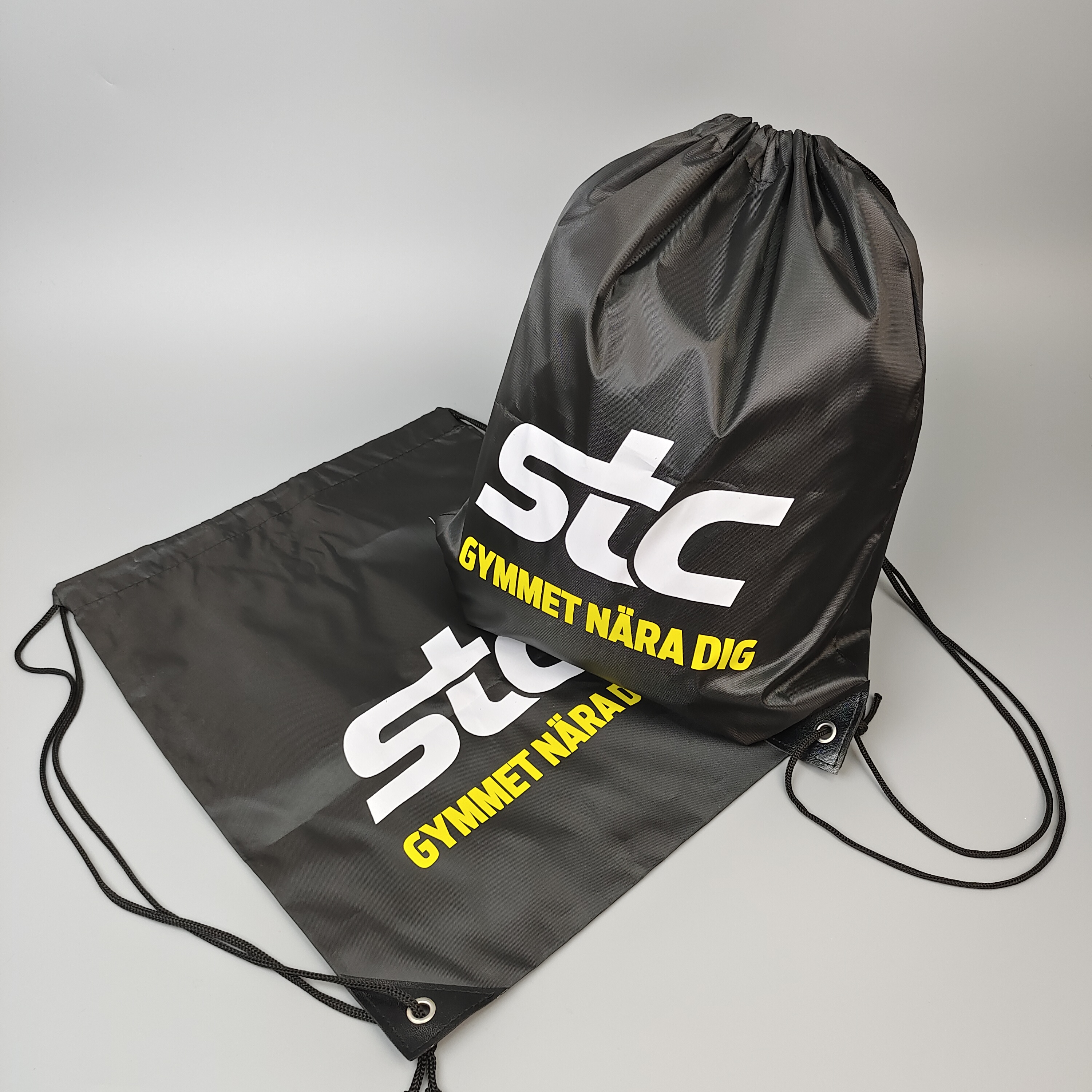 black polyester drawstring backpack with large white printed logo - view 3