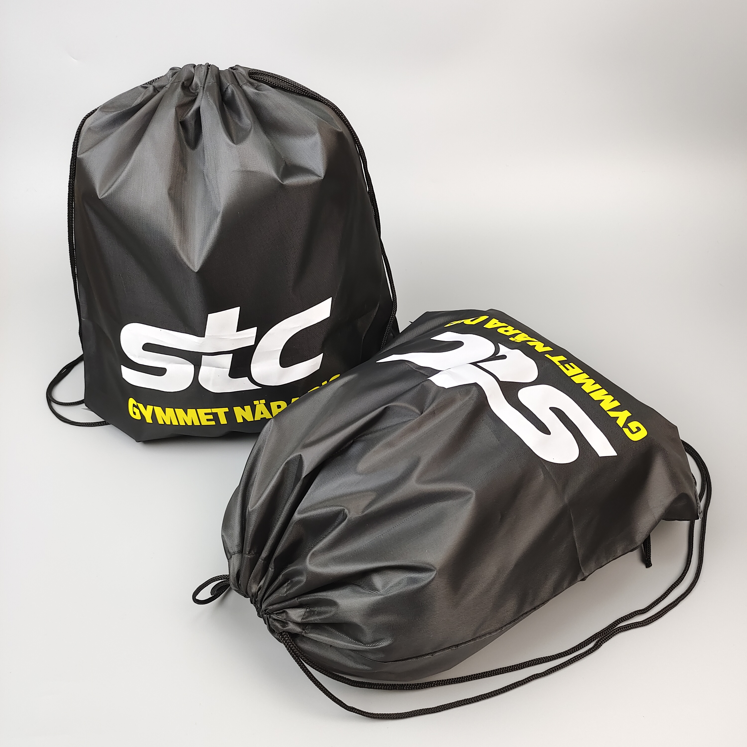 black polyester drawstring backpack with large white printed logo - view 4