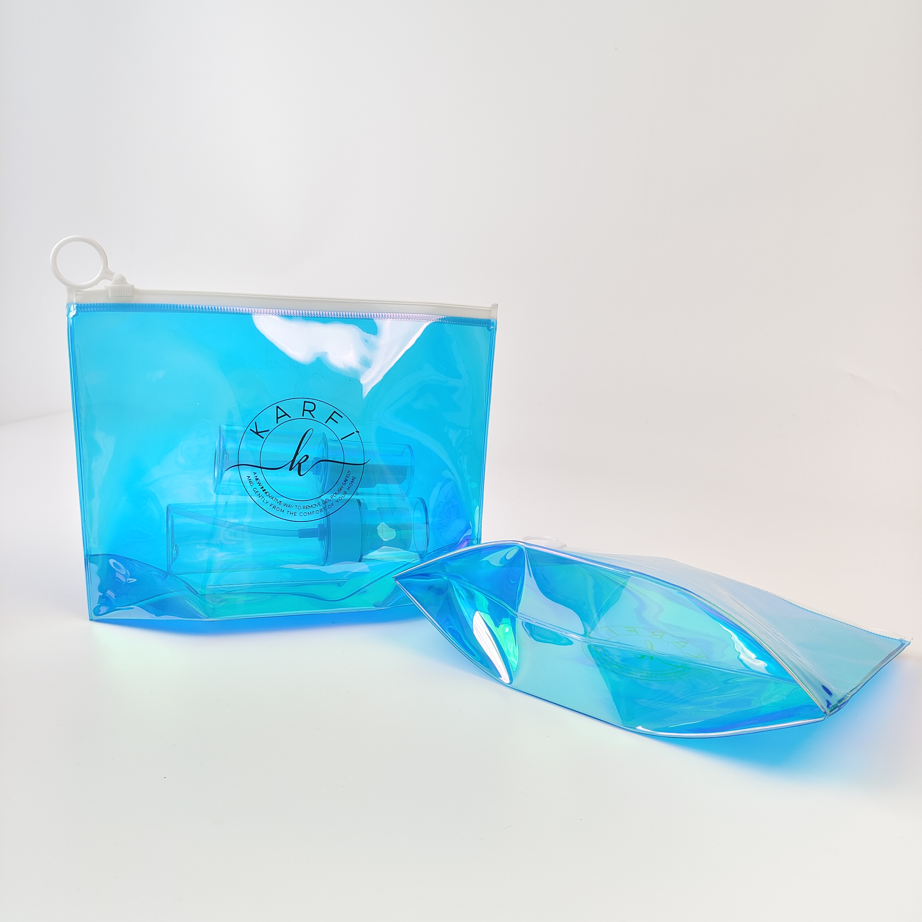 blue holographic PVC zipper pouch with bottom gusset