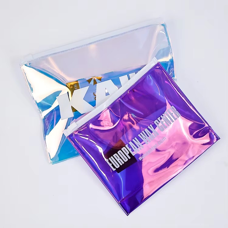 blue holographic PVC makeup pouch with black ring pull and brushes - view 3