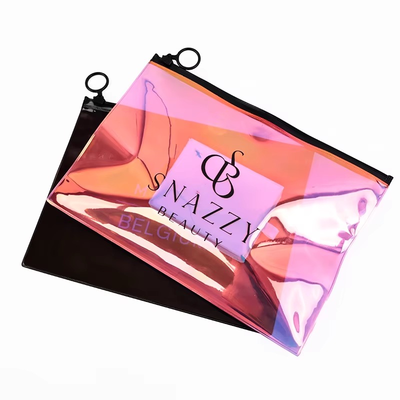 blue holographic PVC makeup pouch with black ring pull and brushes - view 5