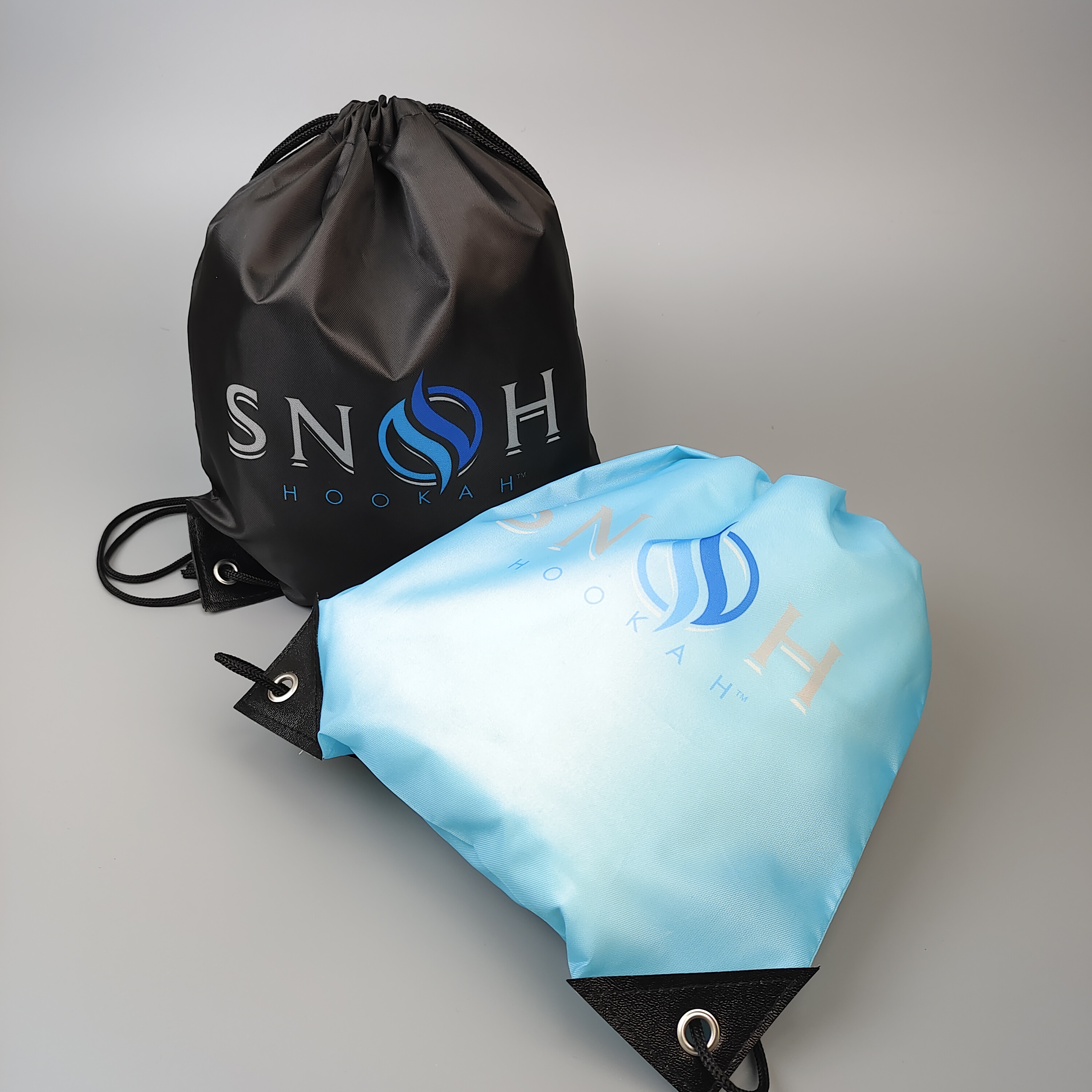 black polyester drawstring backpack with blue and white logo print - view 3