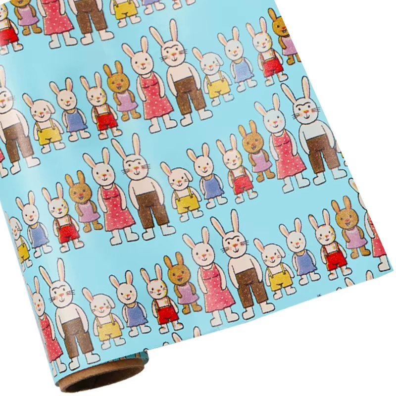 blue rabbit family pattern wrapping paper for children’s gifts