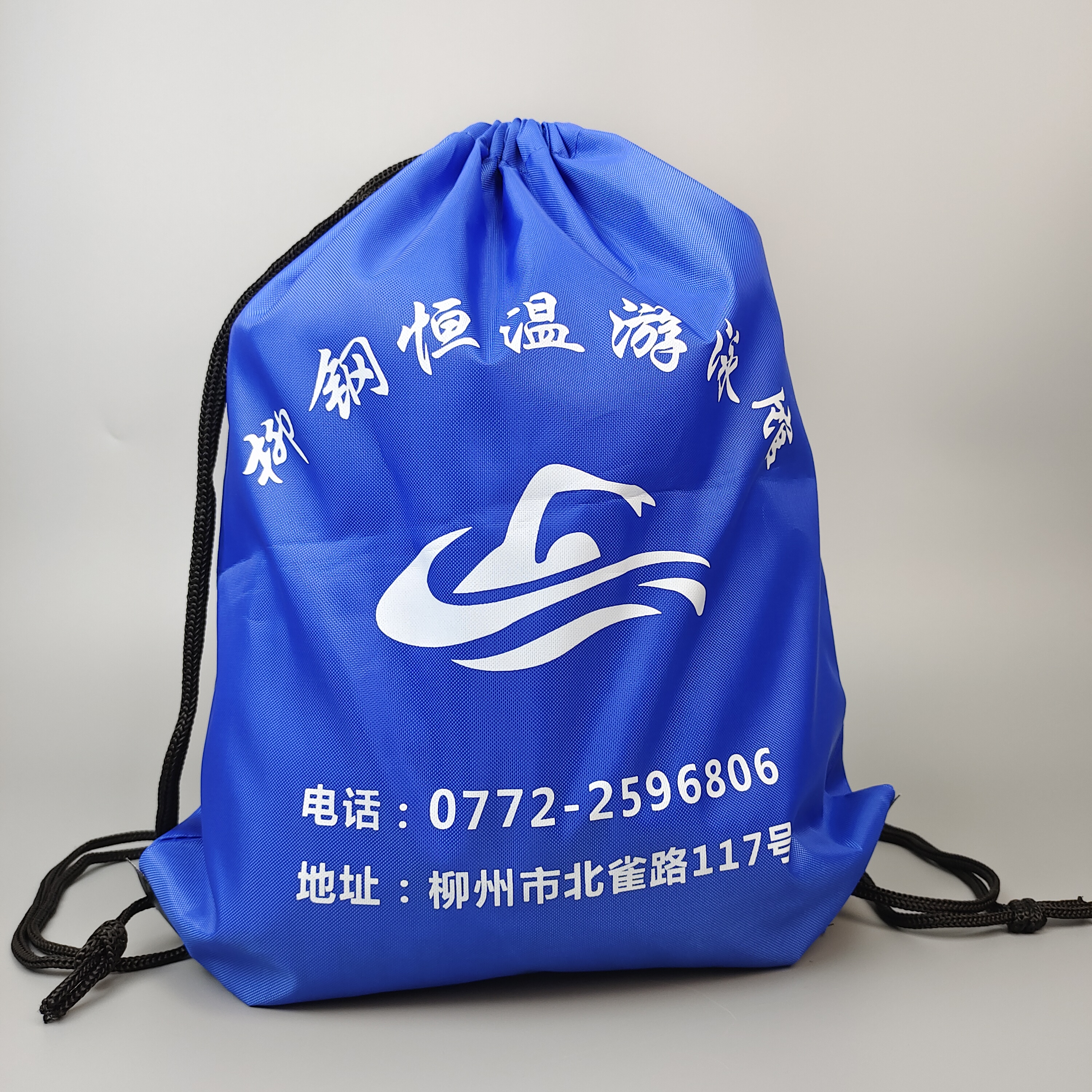 blue polyester drawstring backpack with printed swimming artwork - view 1