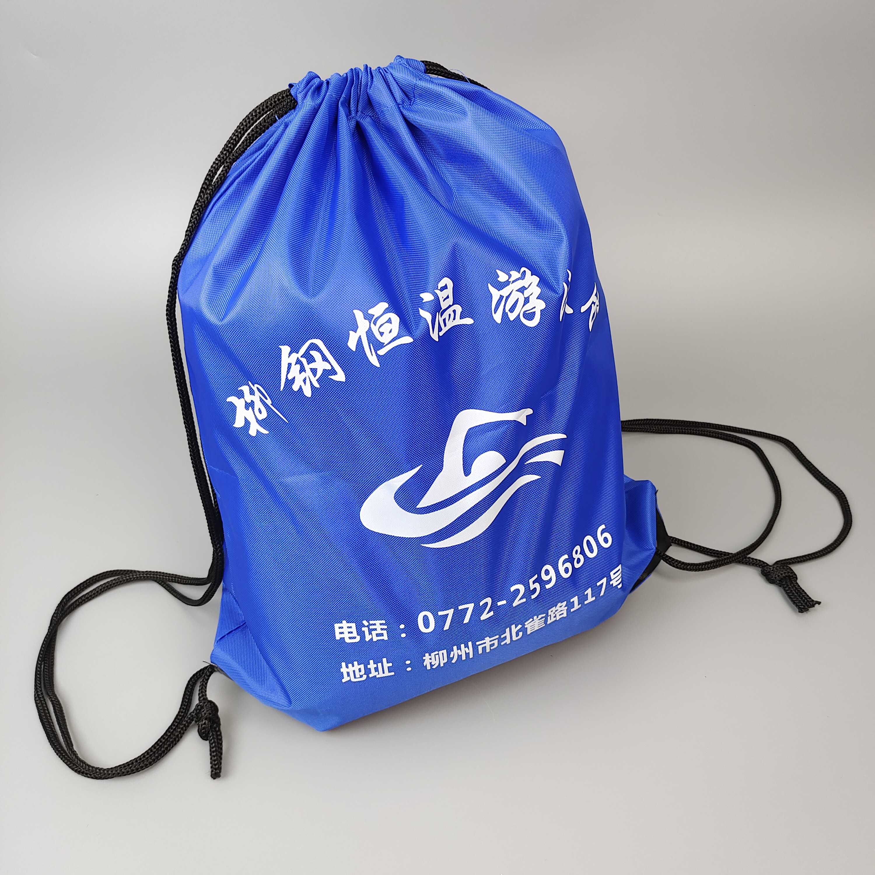 blue polyester drawstring backpack with printed swimming artwork - view 2