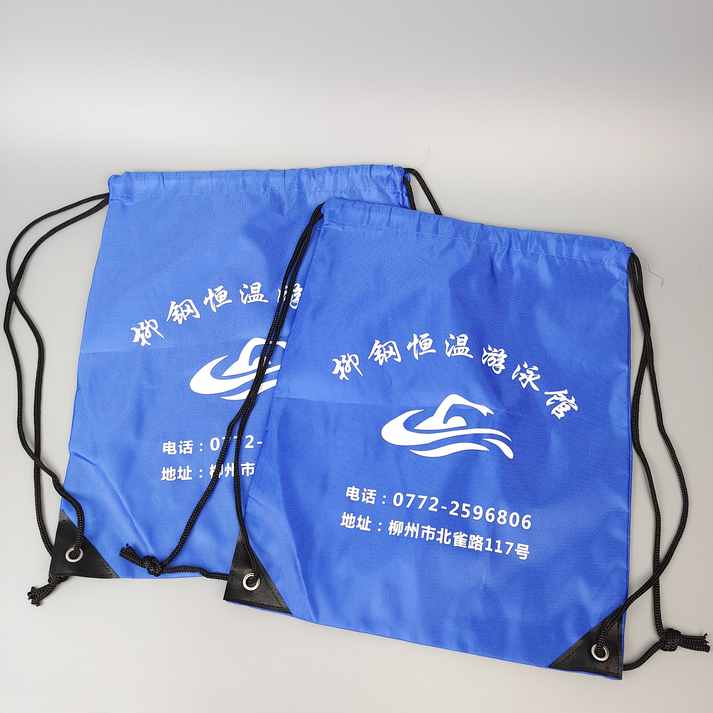 blue polyester drawstring backpack with printed swimming artwork - view 3