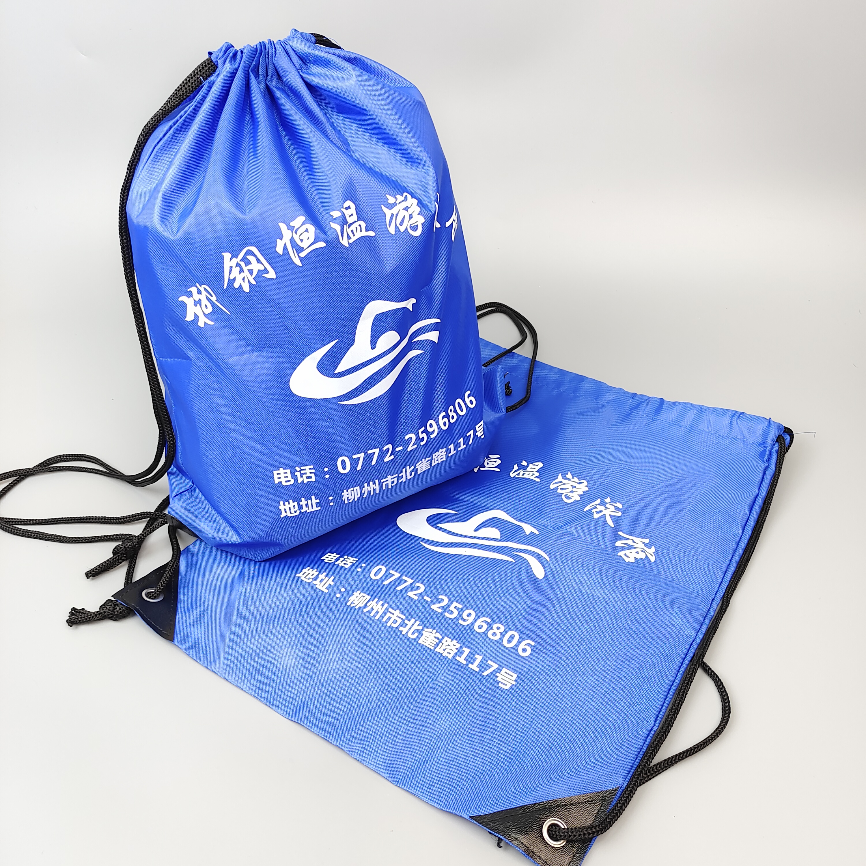blue polyester drawstring backpack with printed swimming artwork - view 5