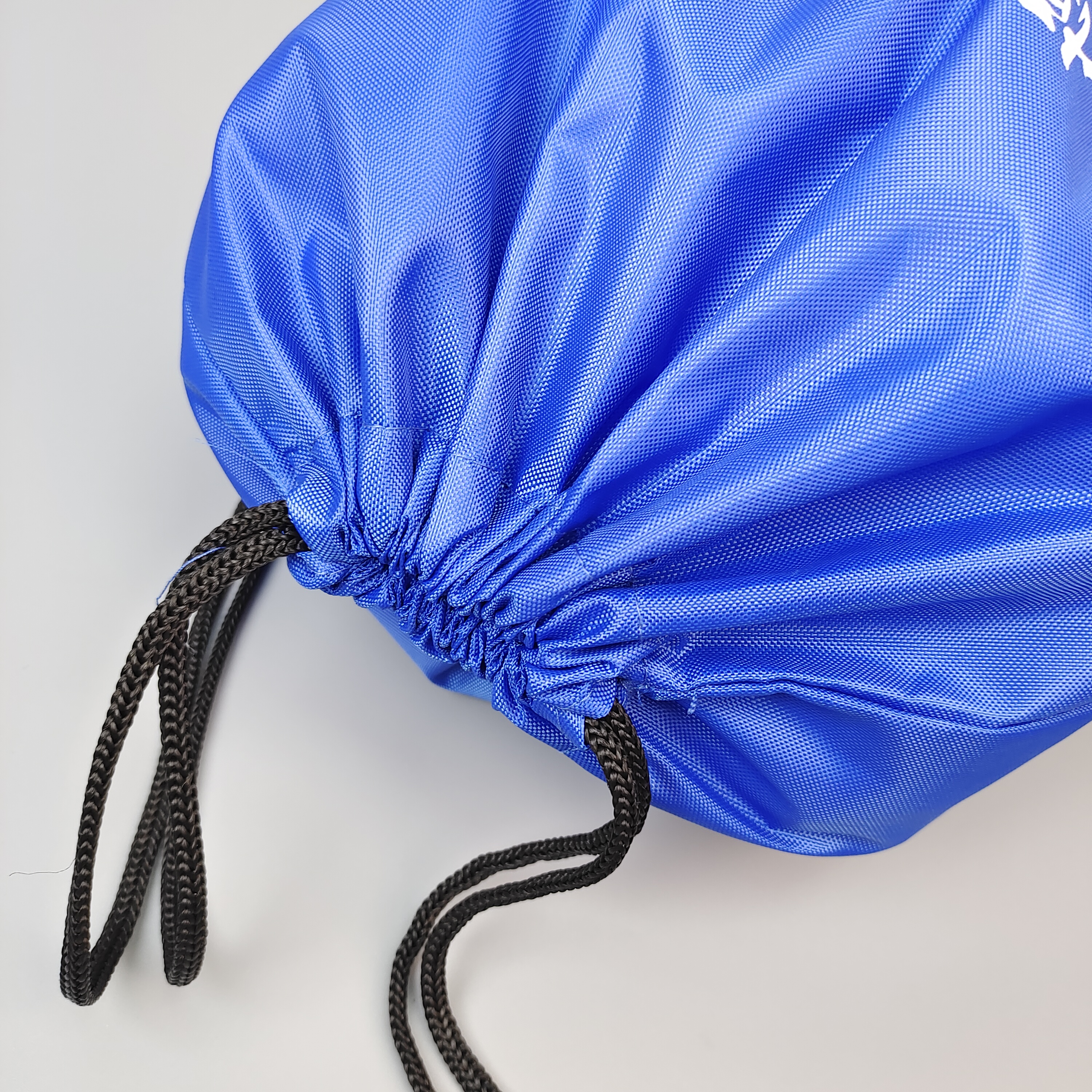 blue polyester drawstring backpack with printed swimming artwork - view 6