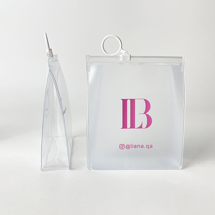 clear PVC cosmetic bag with side gusset and white ring pull zipper - view 1