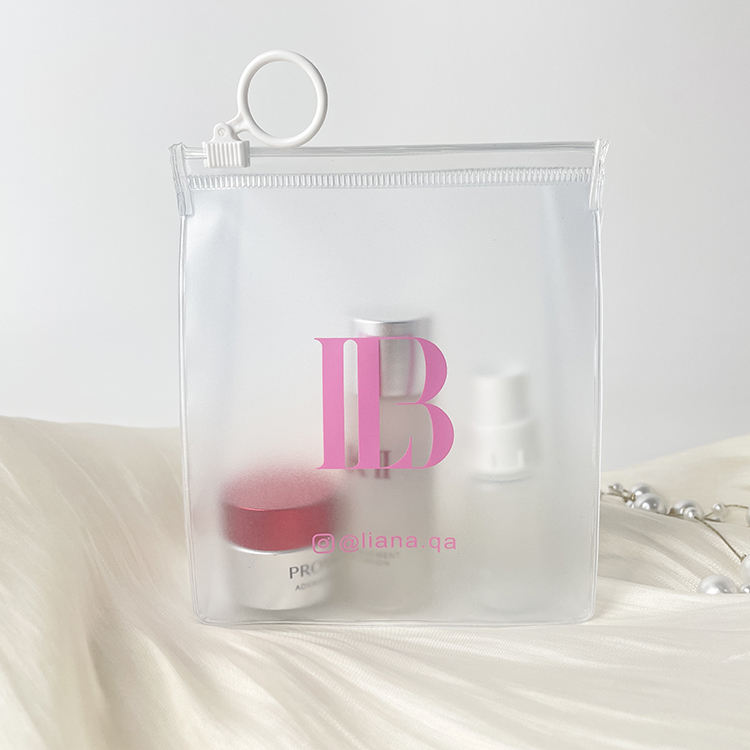 clear PVC cosmetic bag with side gusset and white ring pull zipper - view 3