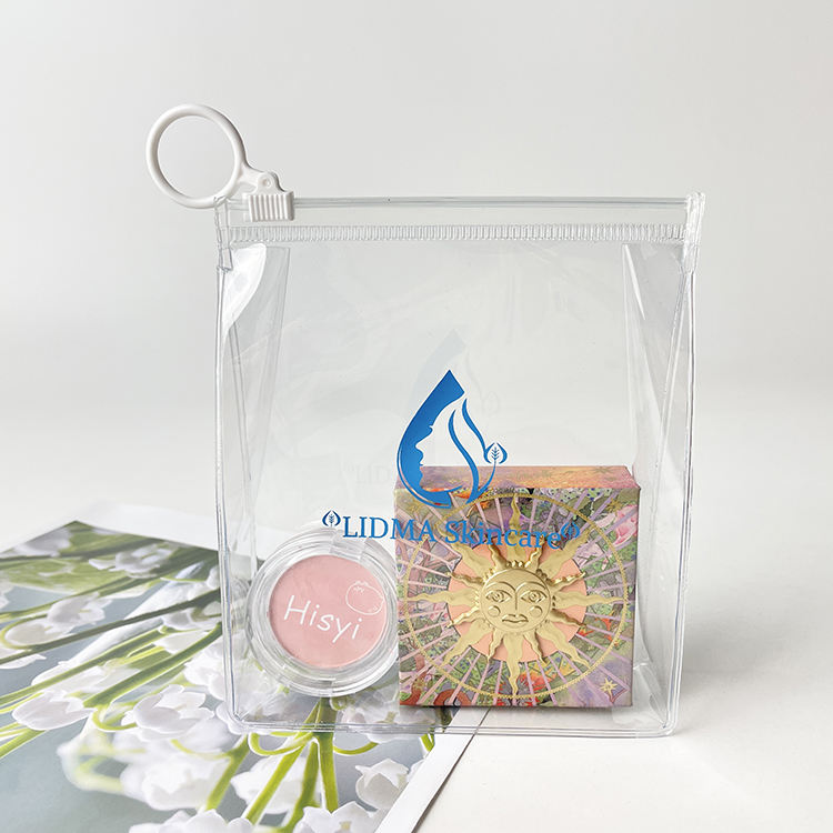 clear PVC cosmetic bag with side gusset and white ring pull zipper - view 4