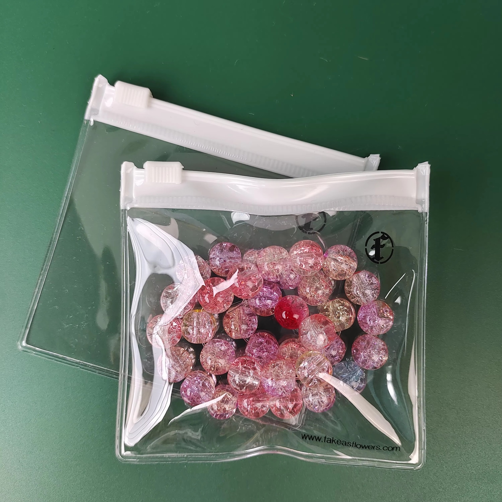 clear PVC jewelry pouches with white zipper and printed black logo - view 2