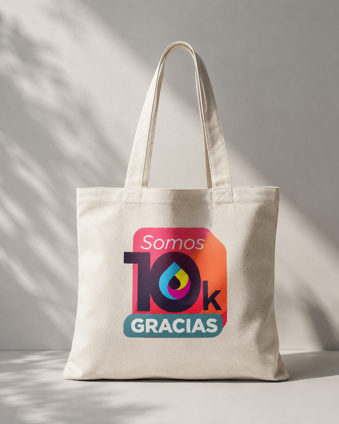 natural canvas tote with colorful thank-you graphic