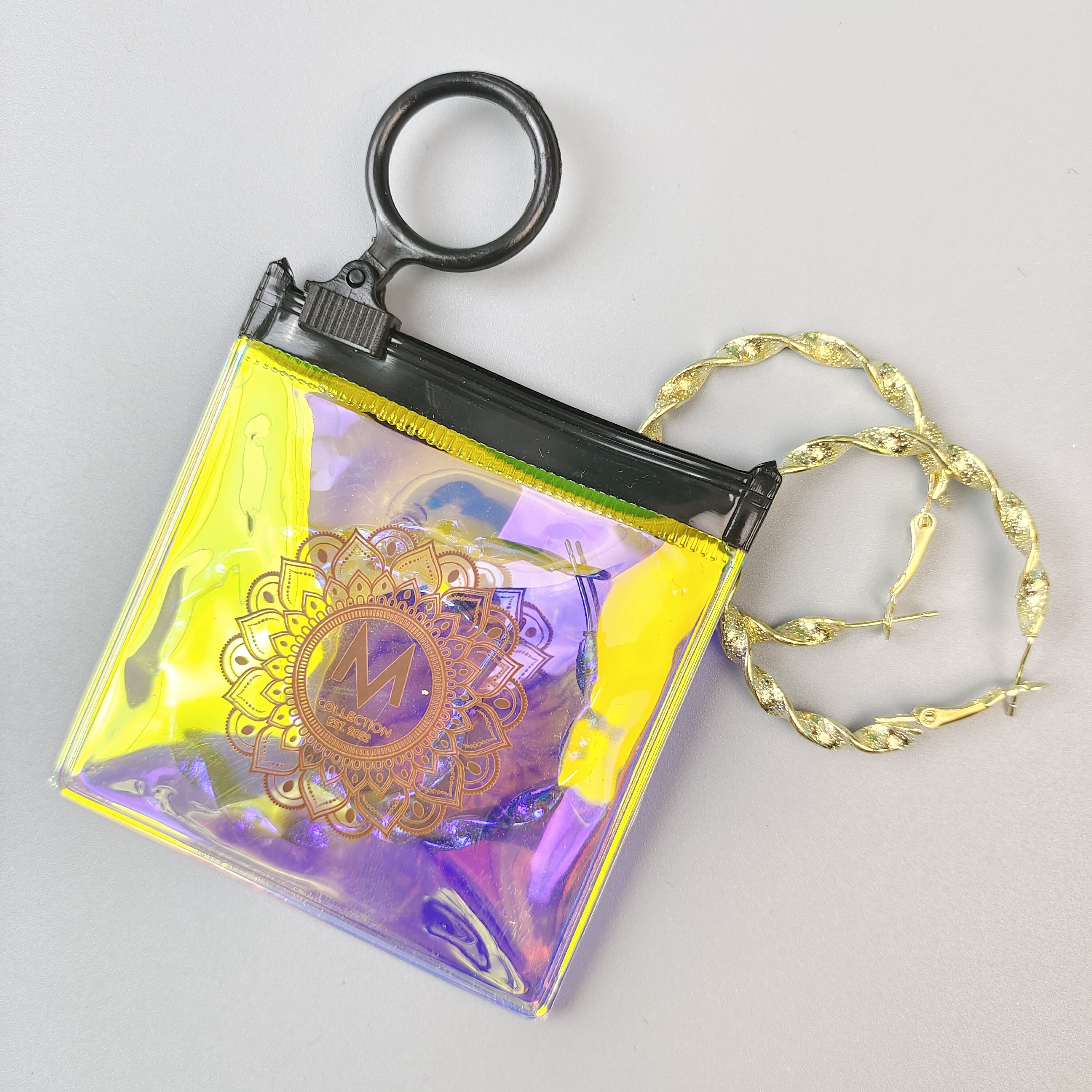 small holographic PVC jewelry pouch with circular black ring pull - view 2
