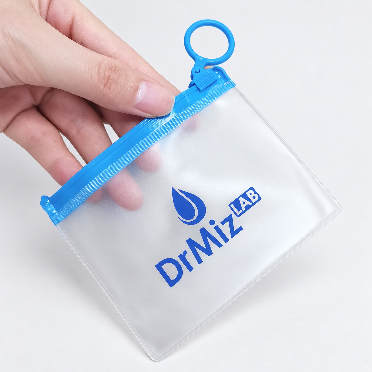 custom frosted PVC zipper pouches with blue ring pulls - view 3