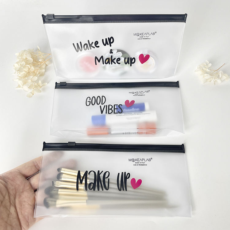 frosted PVC makeup pouch set with black slider closures and printed messages