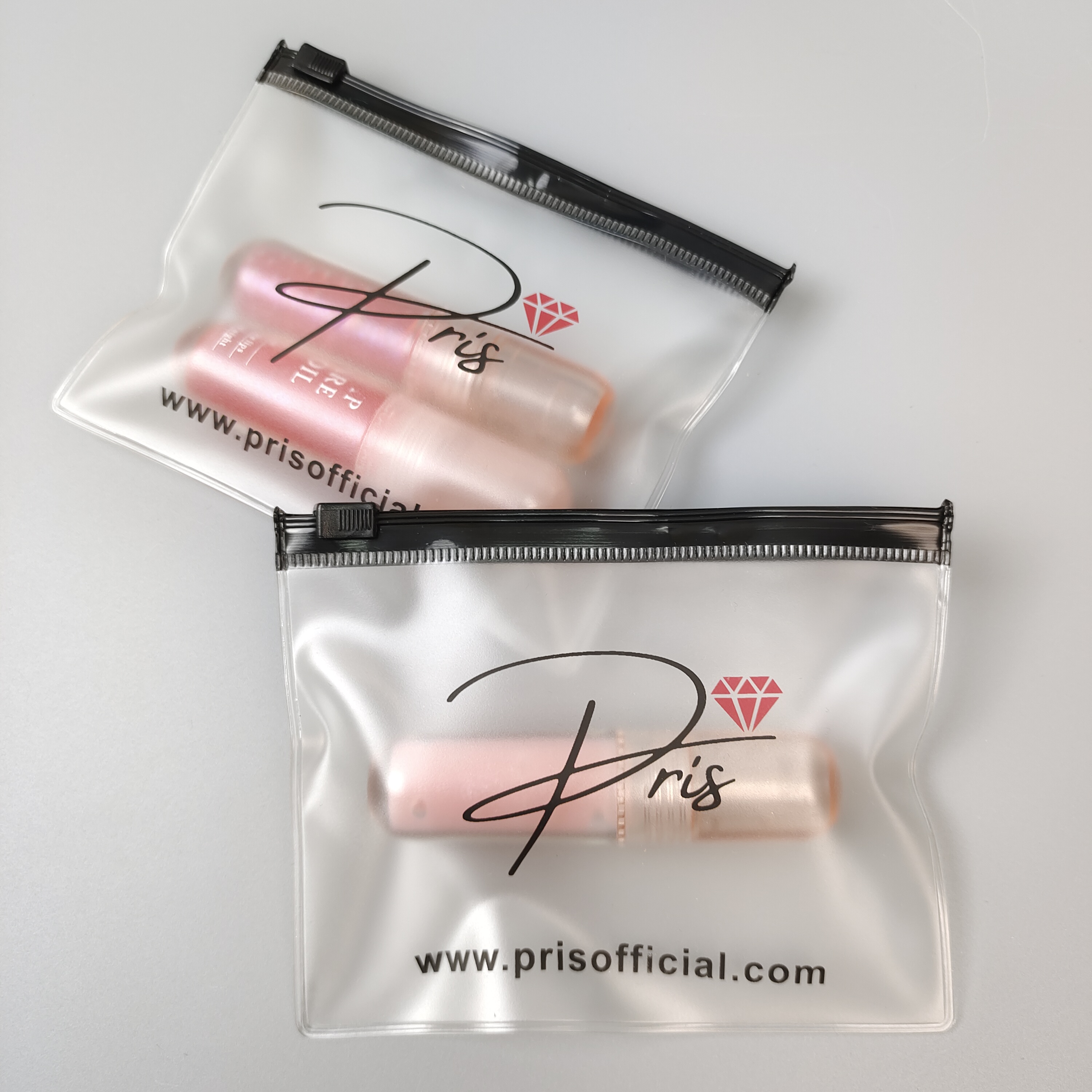 frosted PVC zipper pouch holding cosmetic bottles