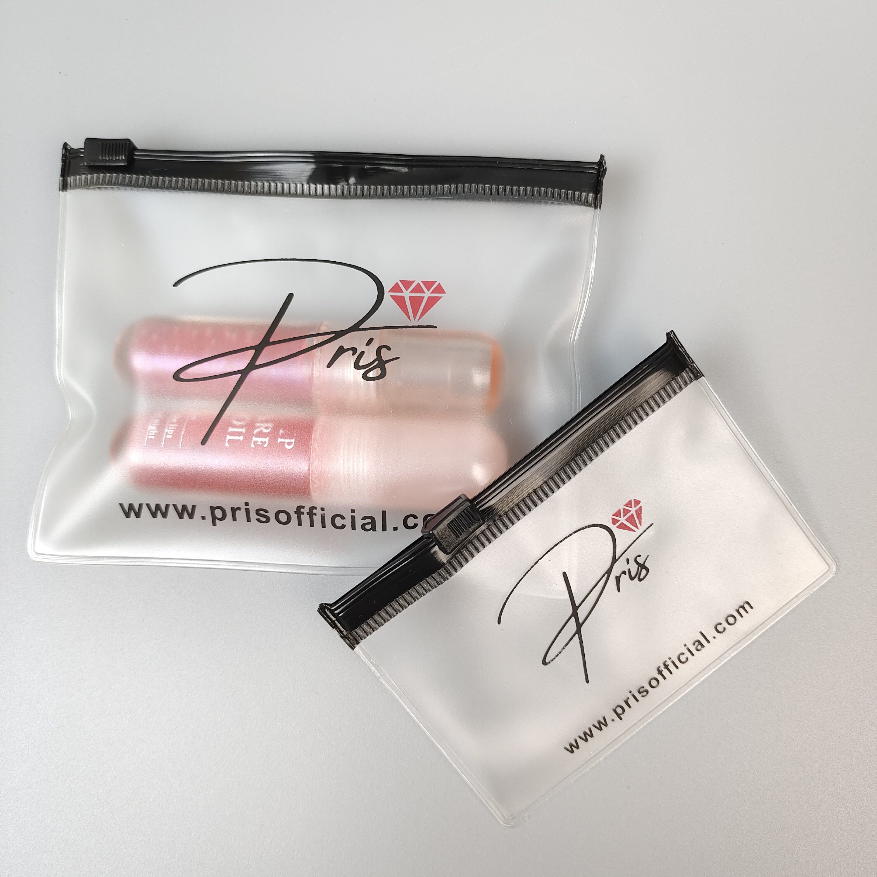 frosted PVC zipper pouch holding cosmetic bottles - view 2