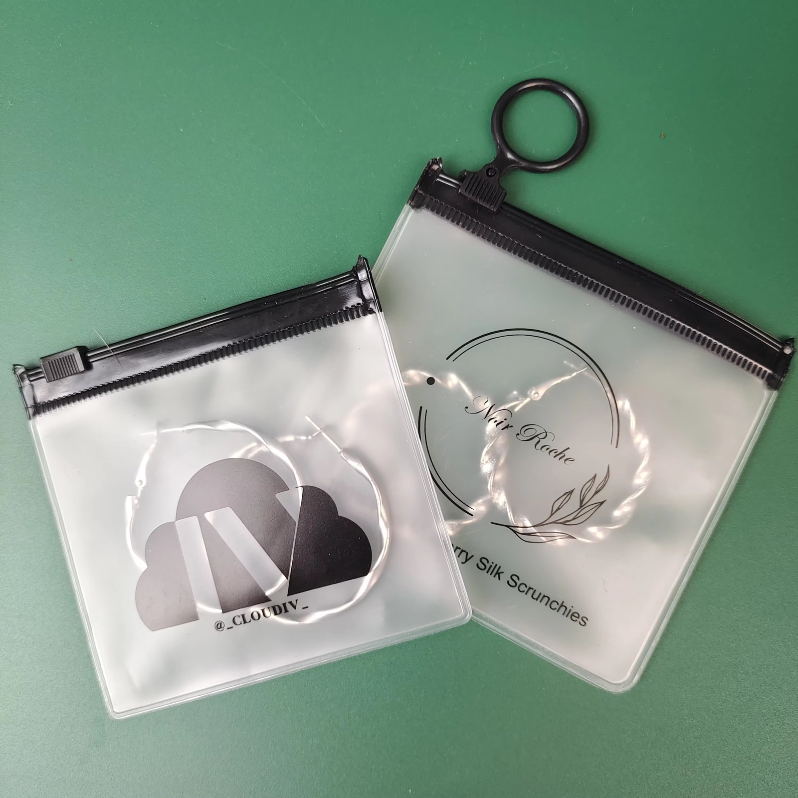 frosted PVC ring pull pouch containing jewelry and hair accessories - view 6