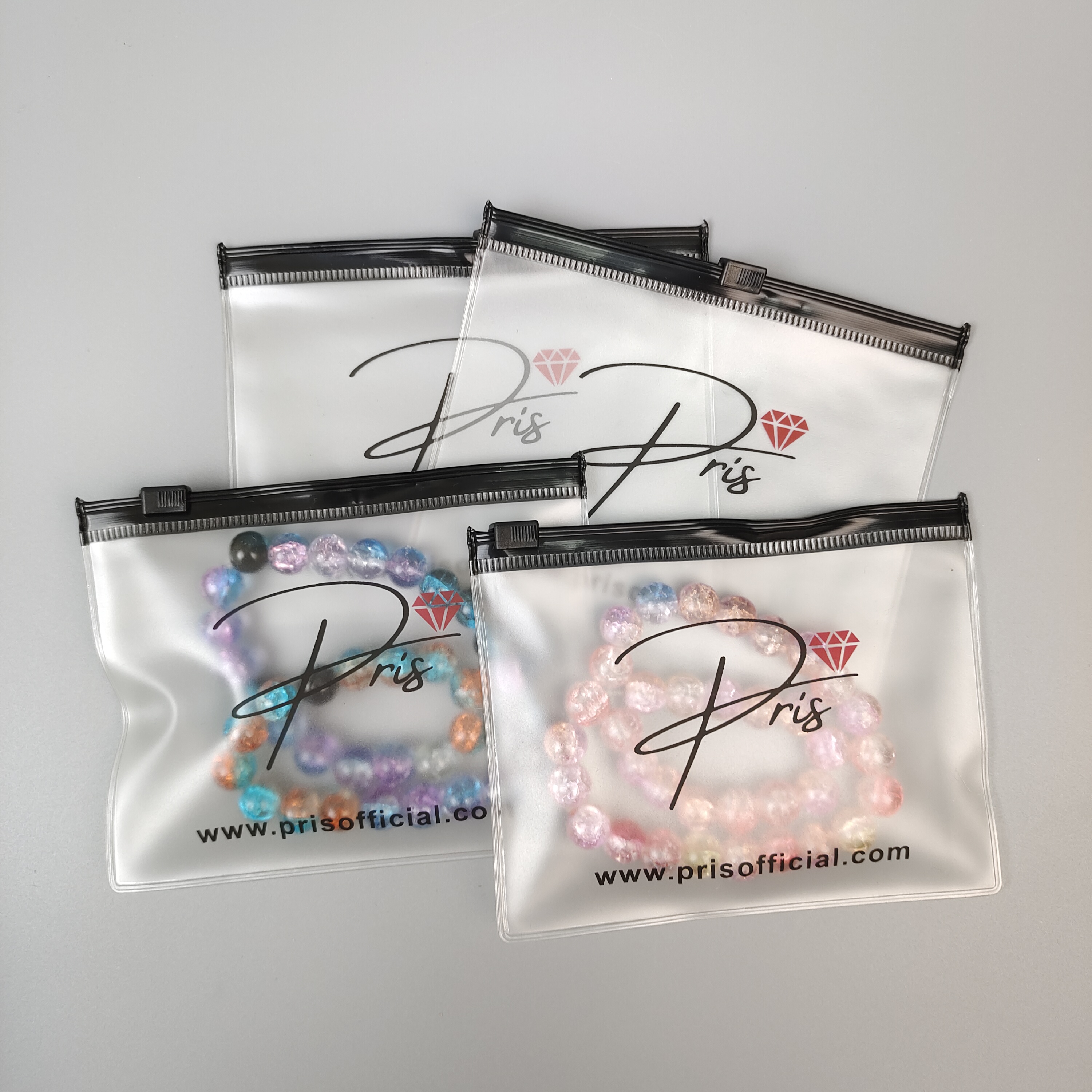 frosted printed PVC zipper bag displaying jewelry - view 3
