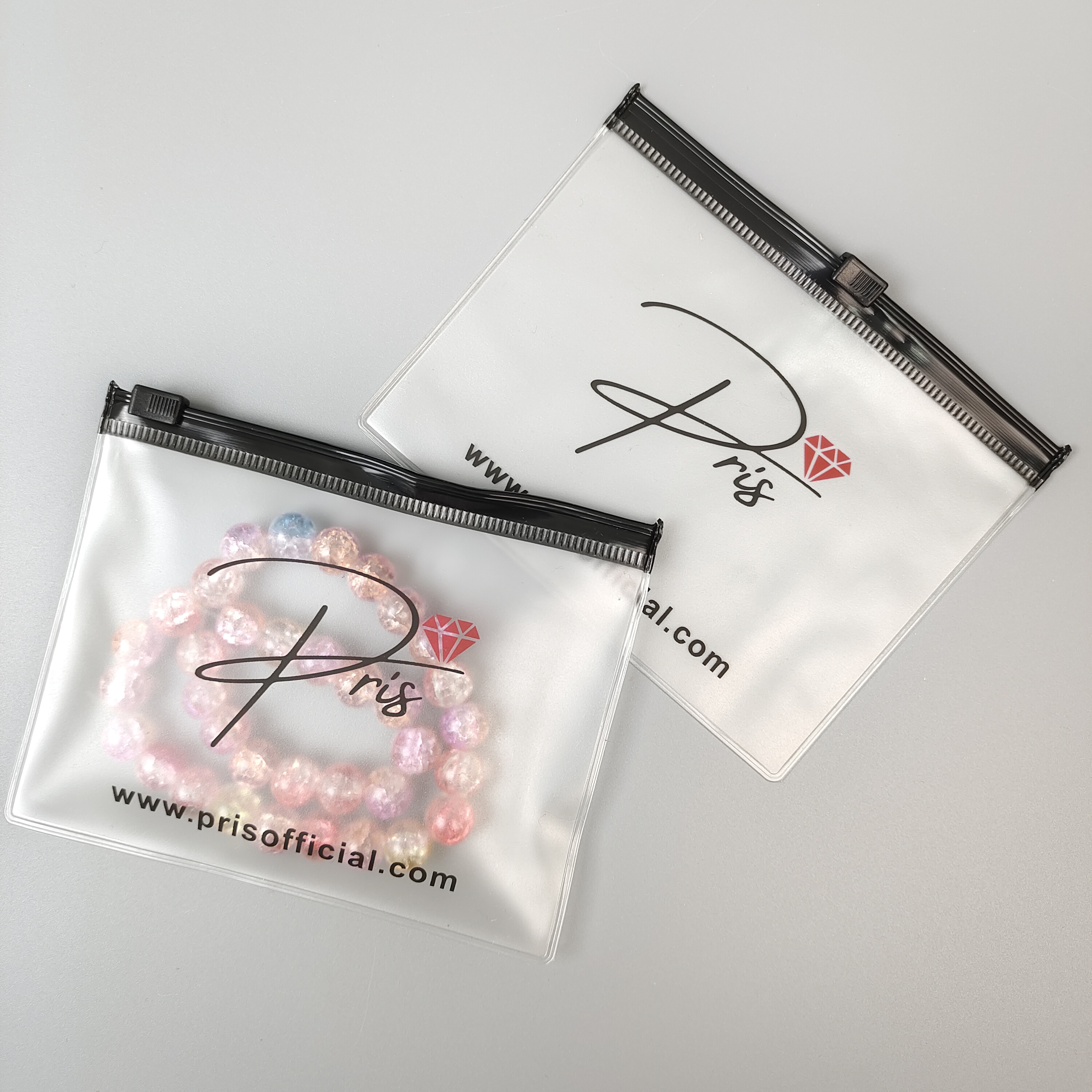 frosted printed PVC zipper bag displaying jewelry - view 5