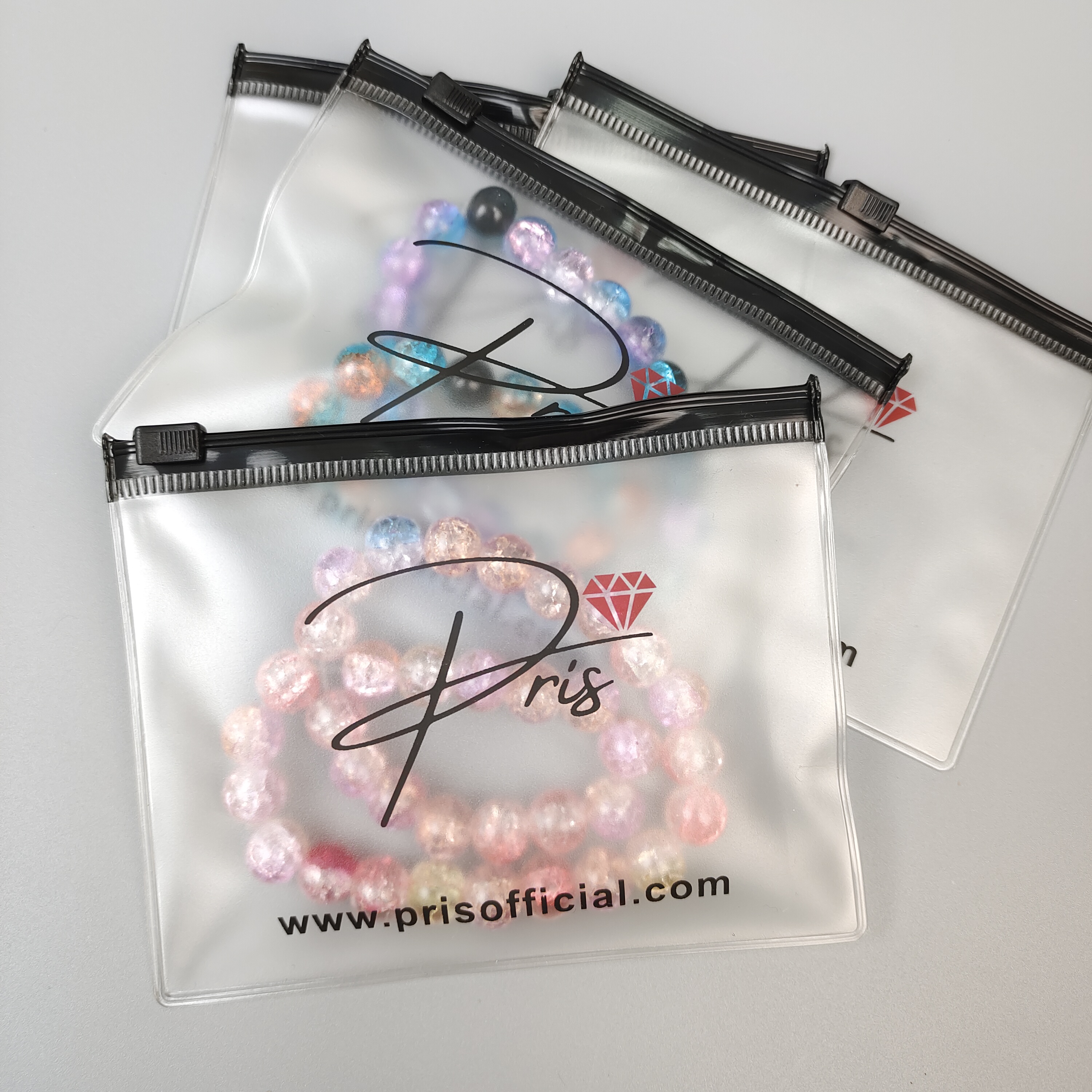 frosted printed PVC zipper bag displaying jewelry - view 6