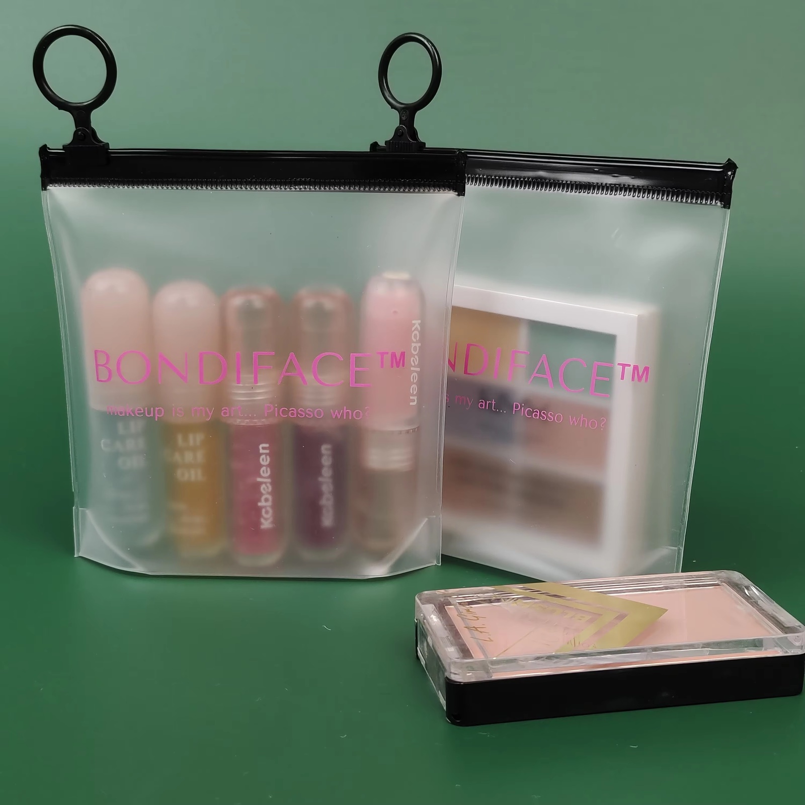frosted PVC makeup pouches with pink logo and black ring pulls - view 6
