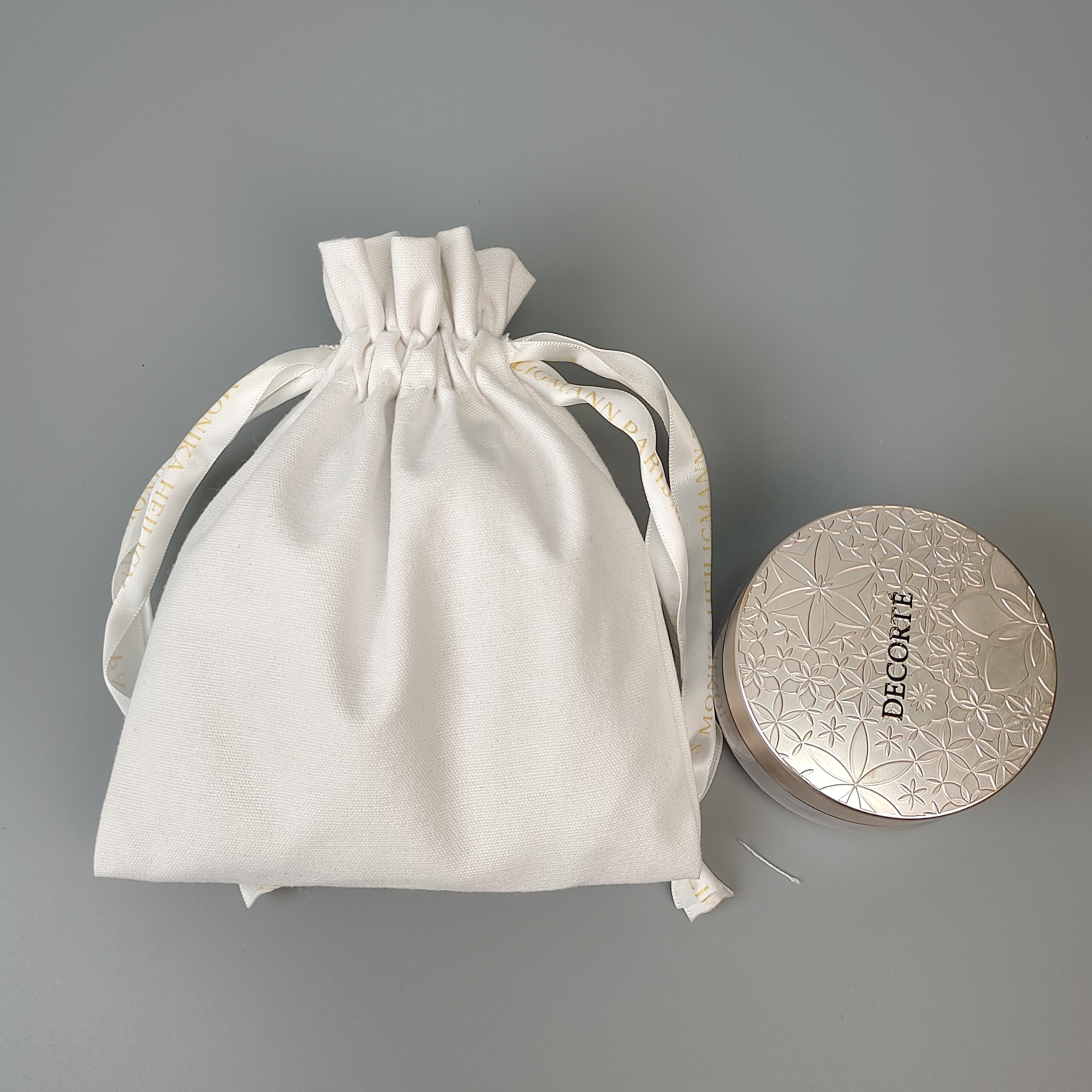 natural cotton drawstring pouch with metallic gold logo - view 3