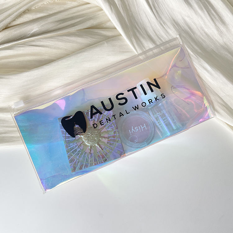 holographic PVC dental kit pouch with white slider and black logo