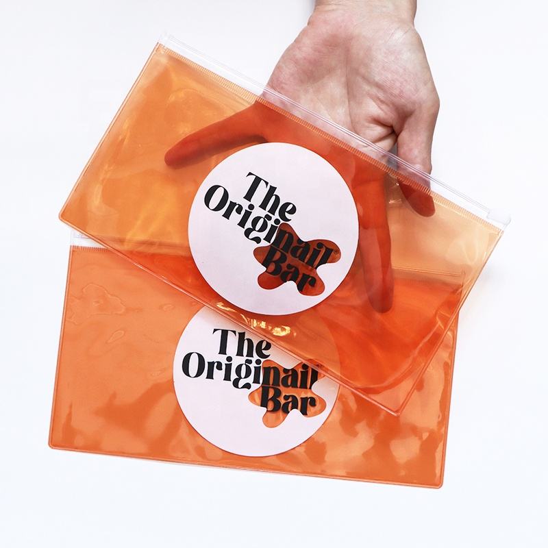 orange transparent PVC toiletry pouch set with white slider closures - view 4