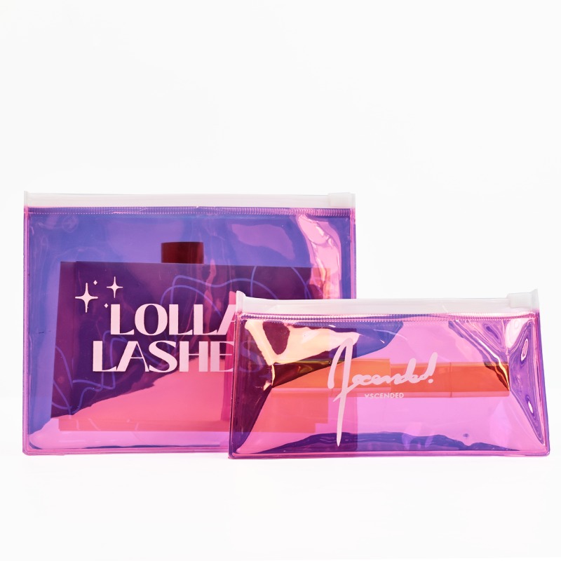 pink holographic PVC cosmetic zipper pouches on white background