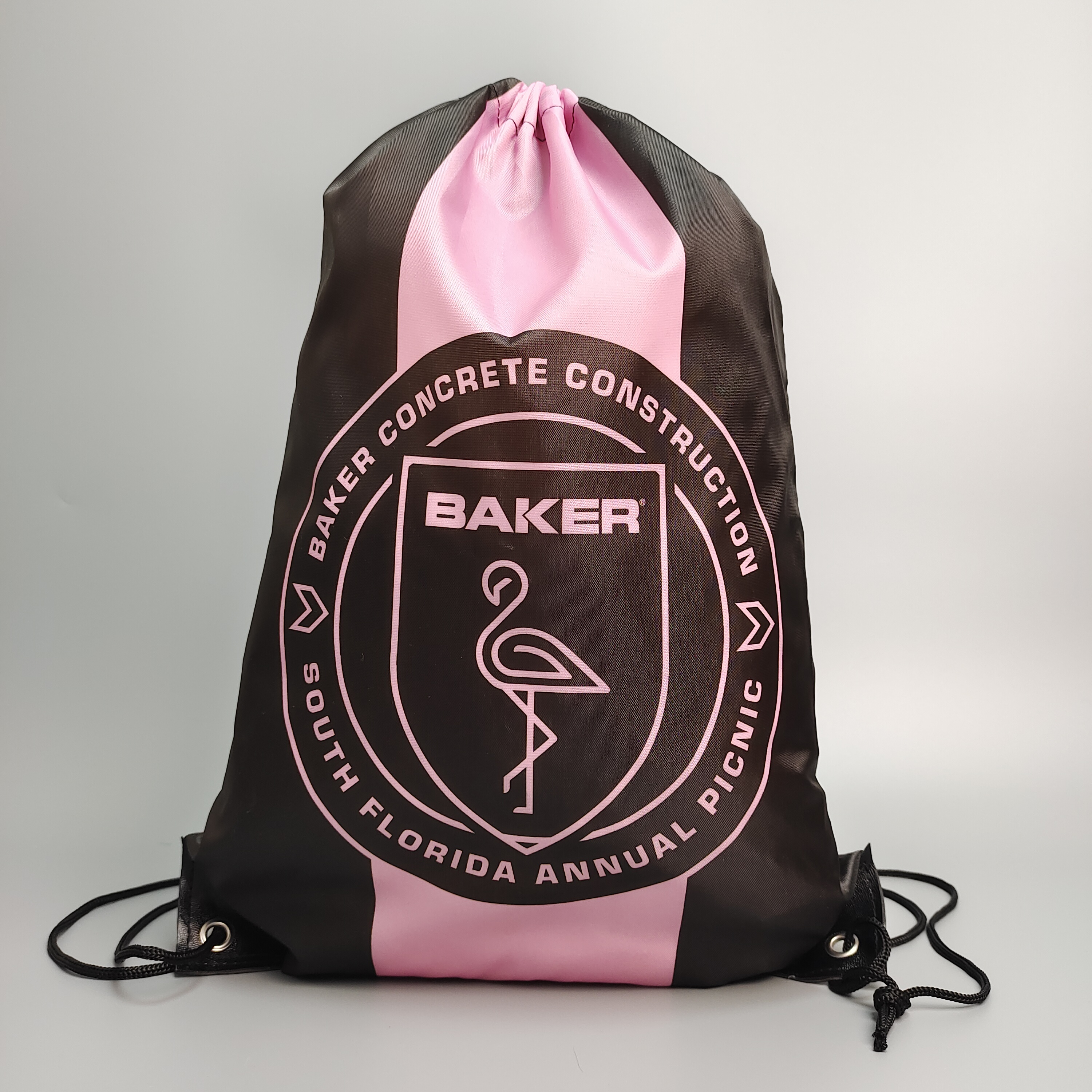 black polyester drawstring backpack with pink and white printed logo - view 2