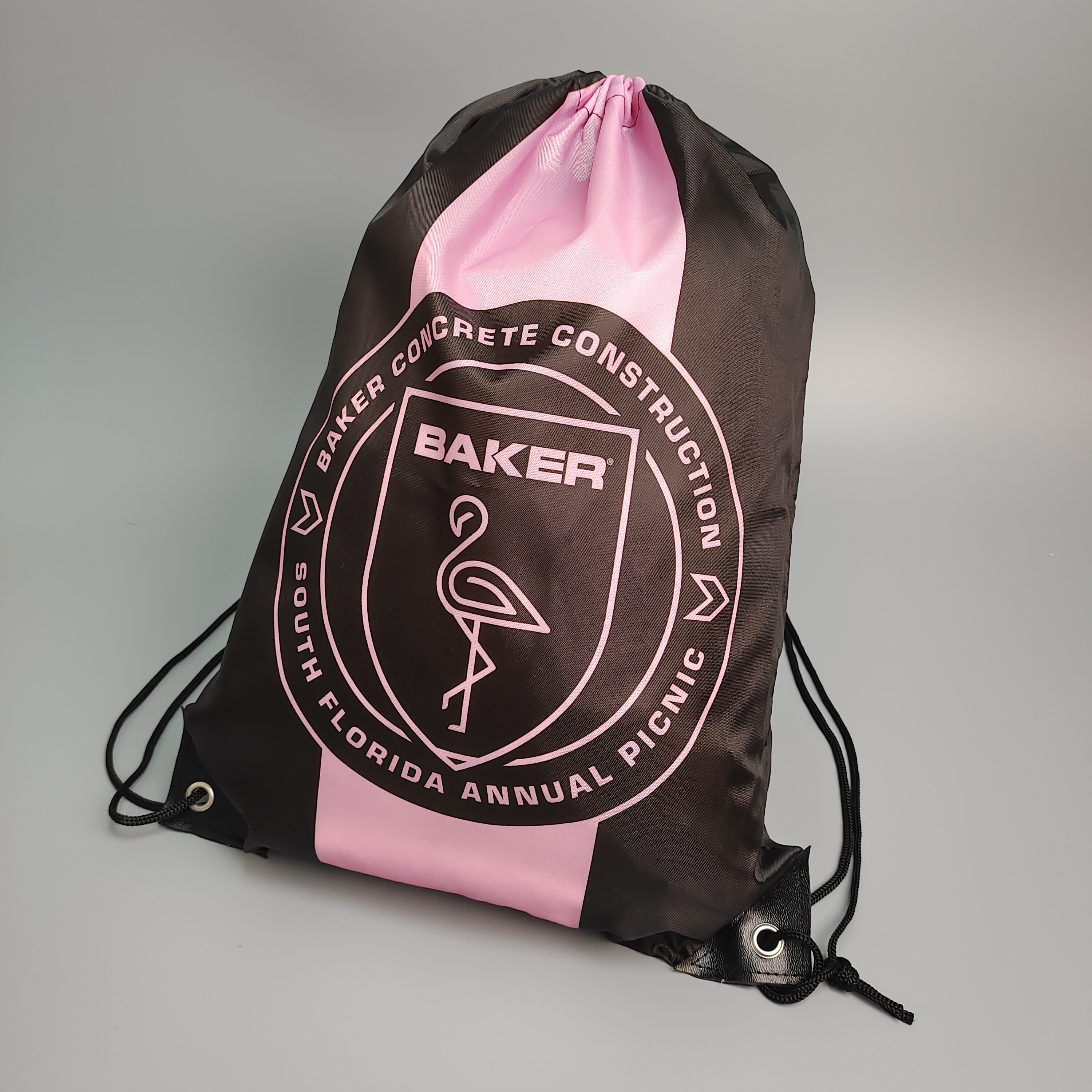 black polyester drawstring backpack with pink and white printed logo - view 3