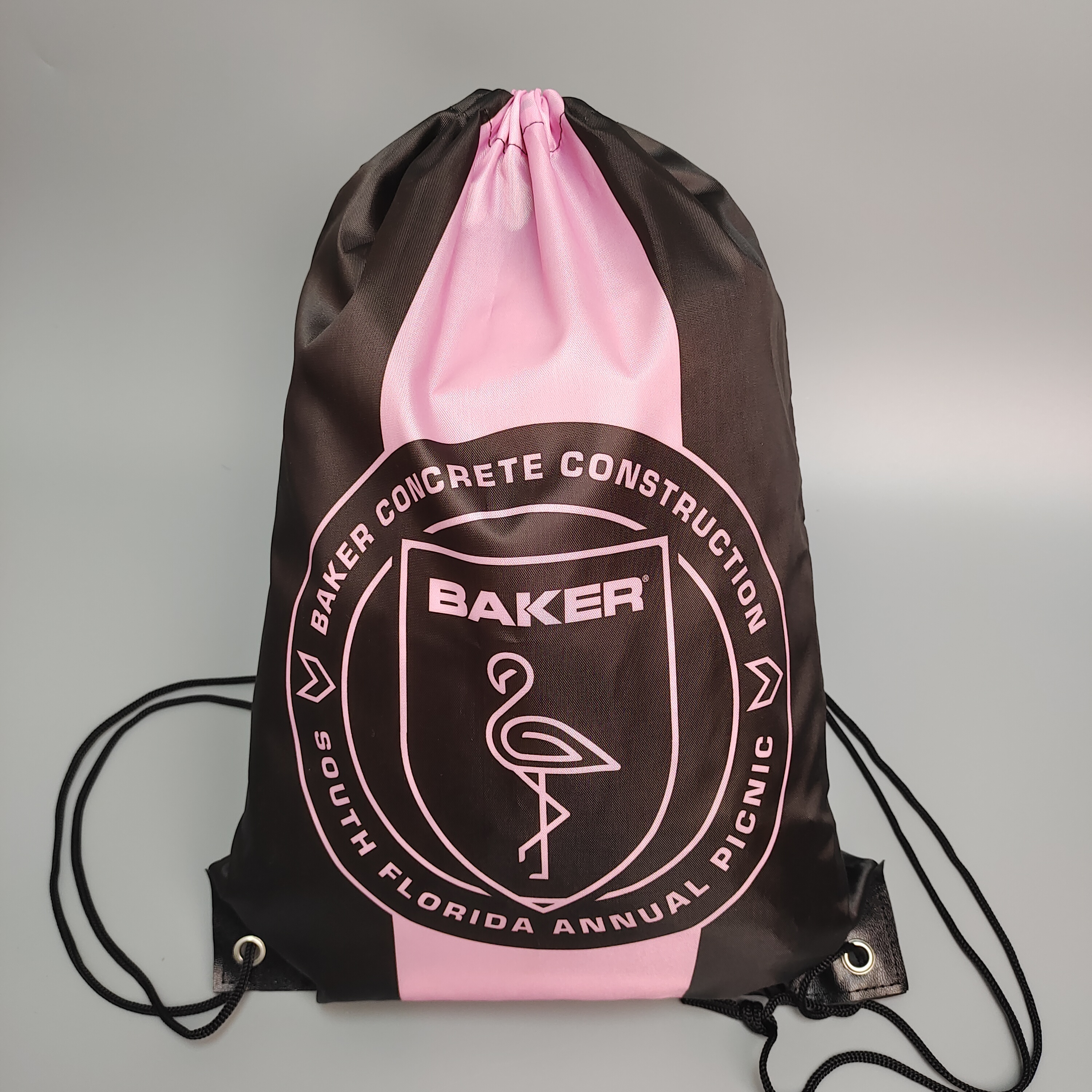 black polyester drawstring backpack with pink and white printed logo - view 4