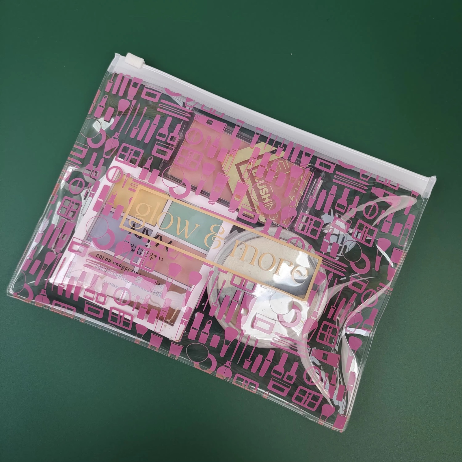 pink printed clear PVC makeup pouch with white slider zipper - view 1