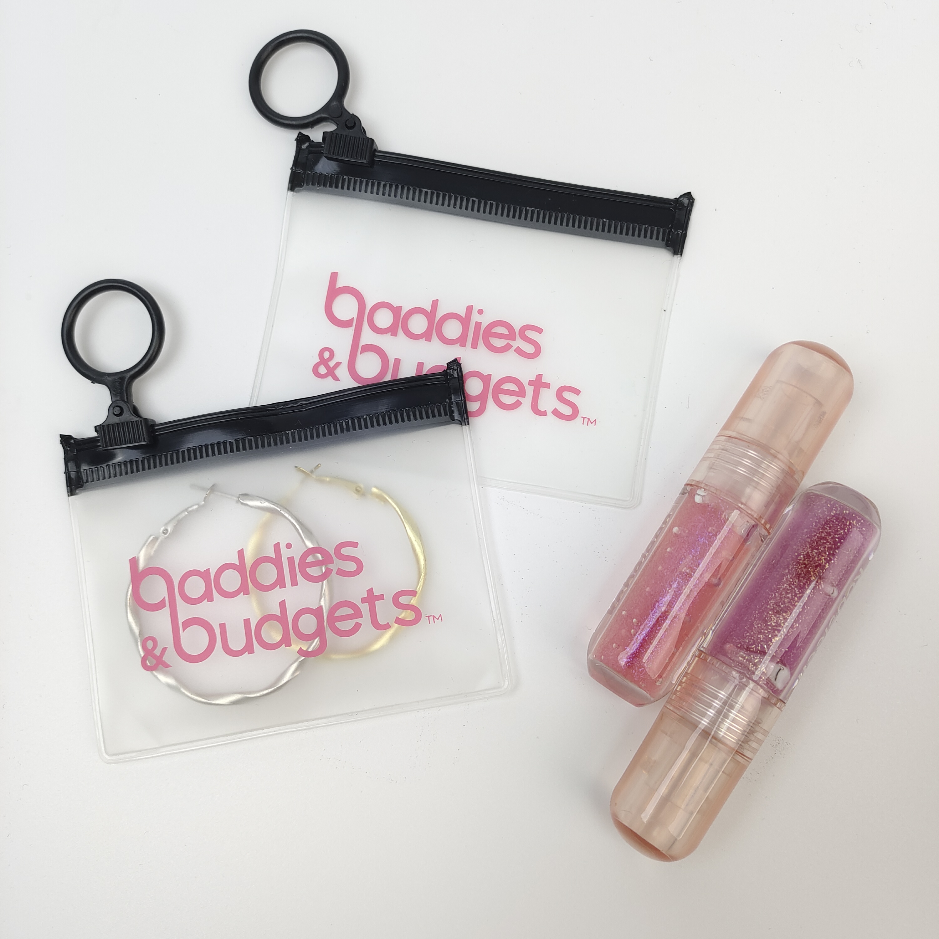 clear PVC zipper bag with pink printed branding