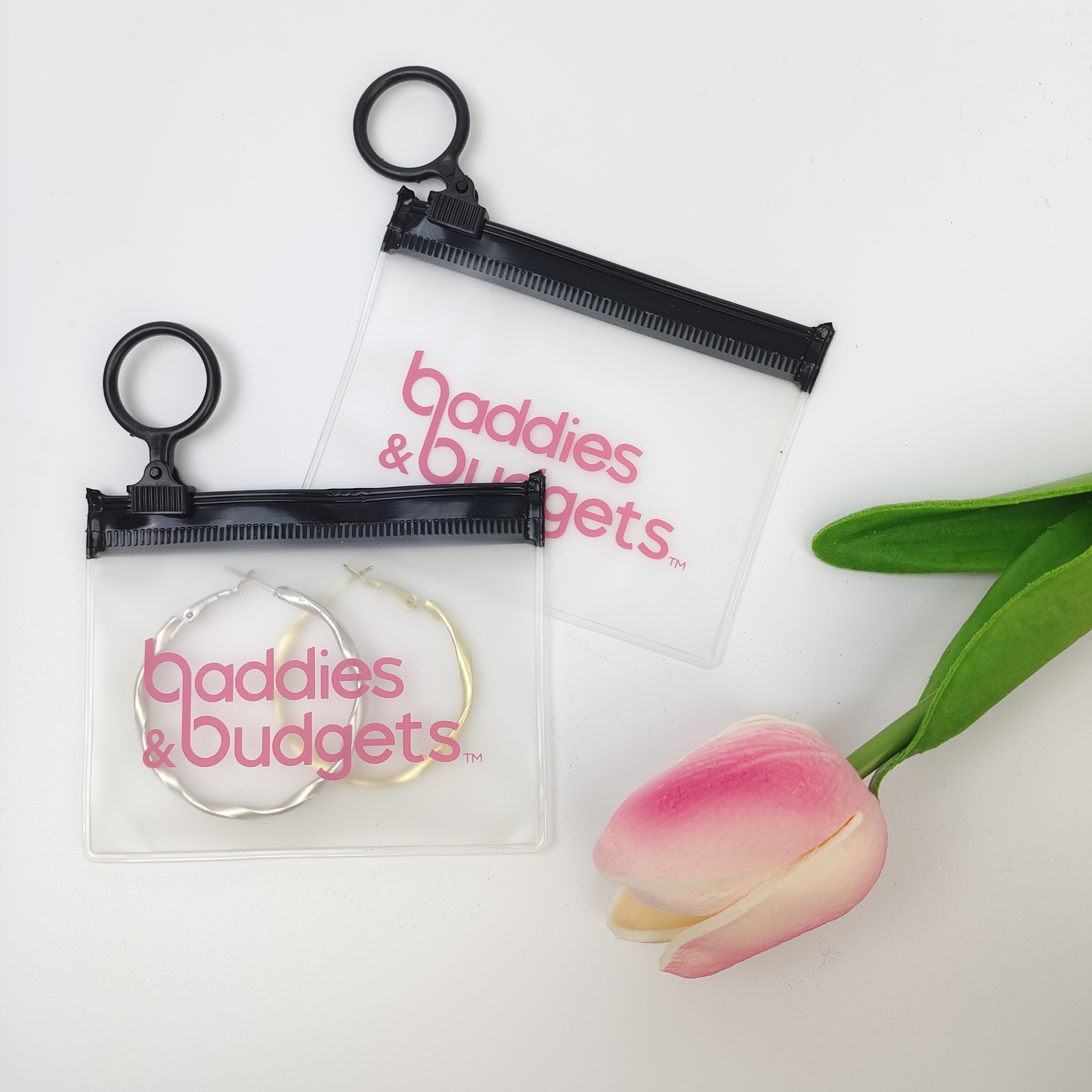 clear PVC zipper bag with pink printed branding - view 2