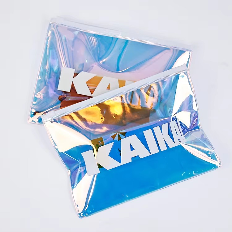 pink transparent PVC cosmetic pouch with black zipper and circular ring pull - view 5