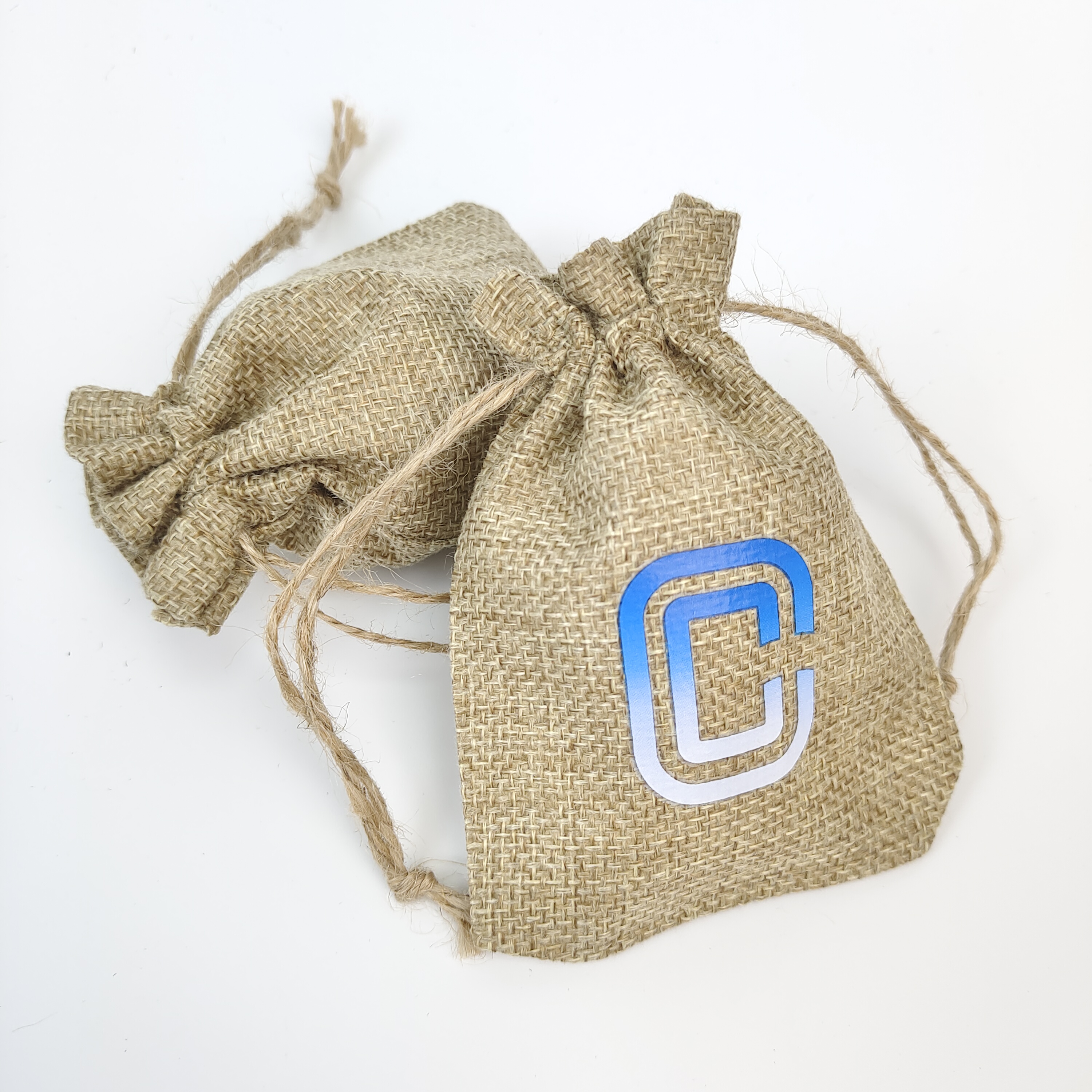 natural jute drawstring gift bags with red printed patterns - view 1