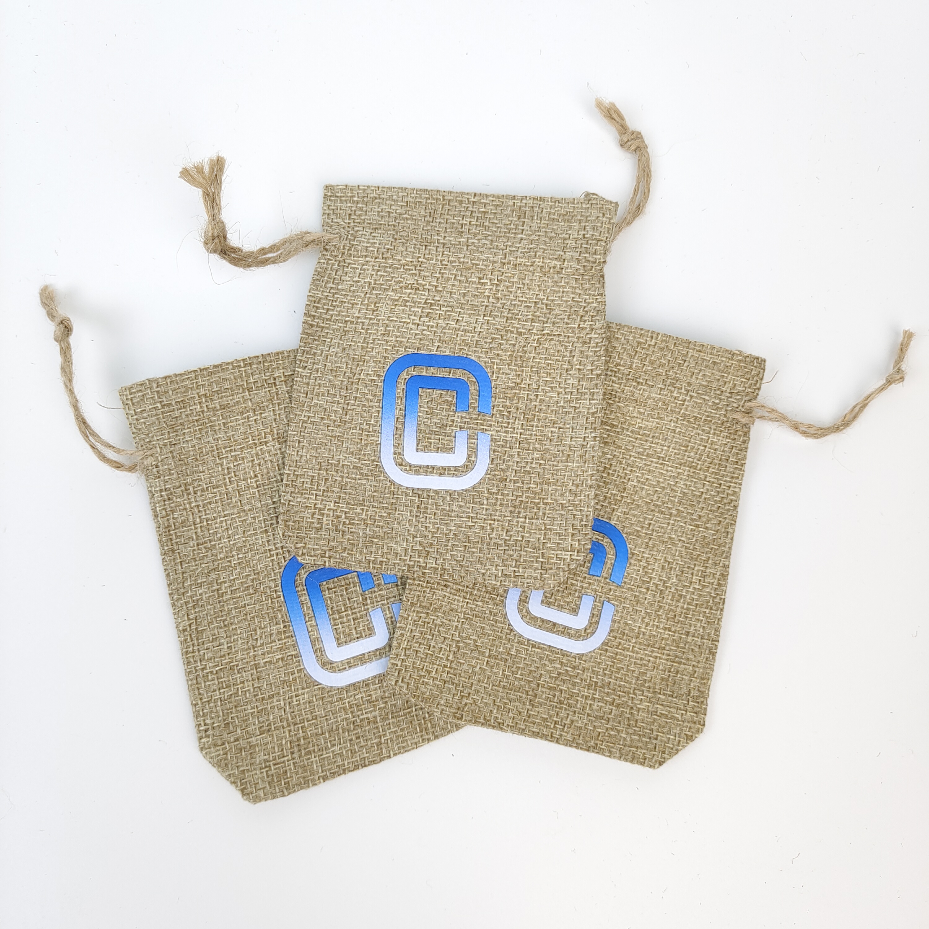 natural jute drawstring gift bags with red printed patterns - view 2