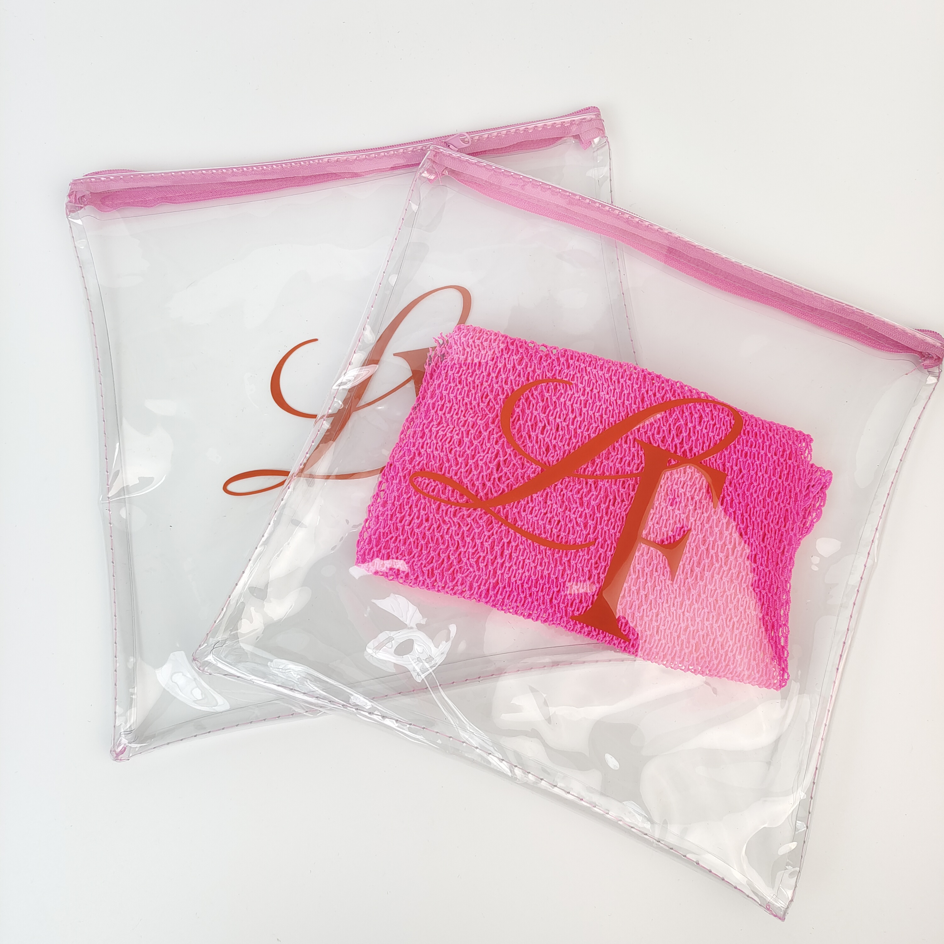 sewn clear PVC pouch with pink zipper and printed artwork - view 3