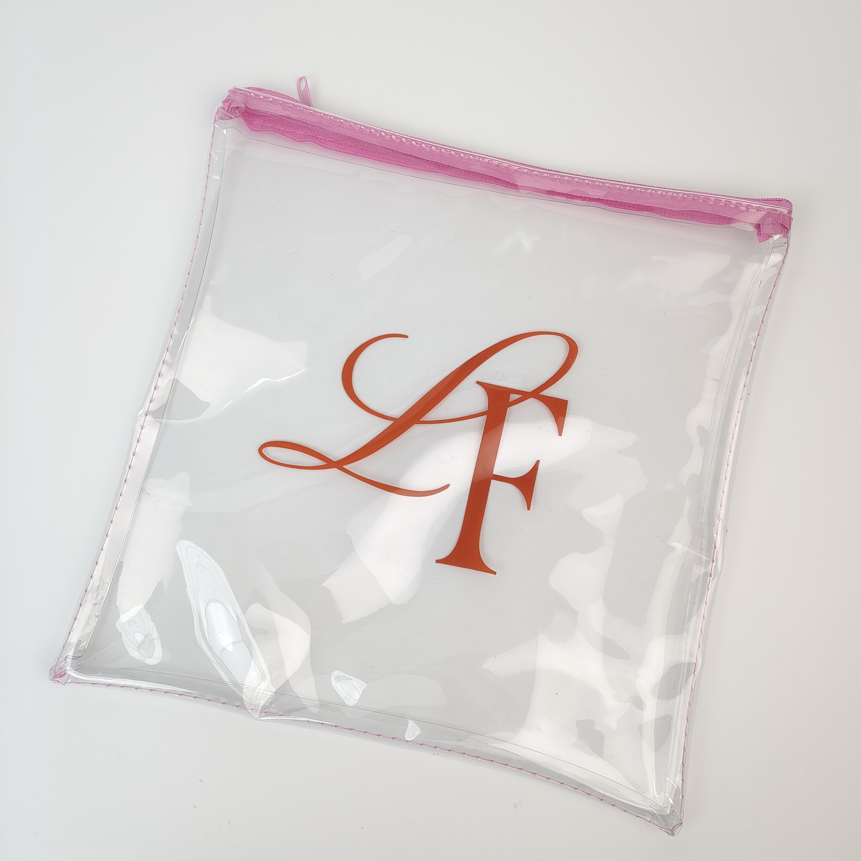 sewn clear PVC pouch with pink zipper and printed artwork - view 6