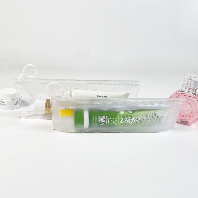 slim frosted PVC toothbrush pouch with white circular ring pull - view 2