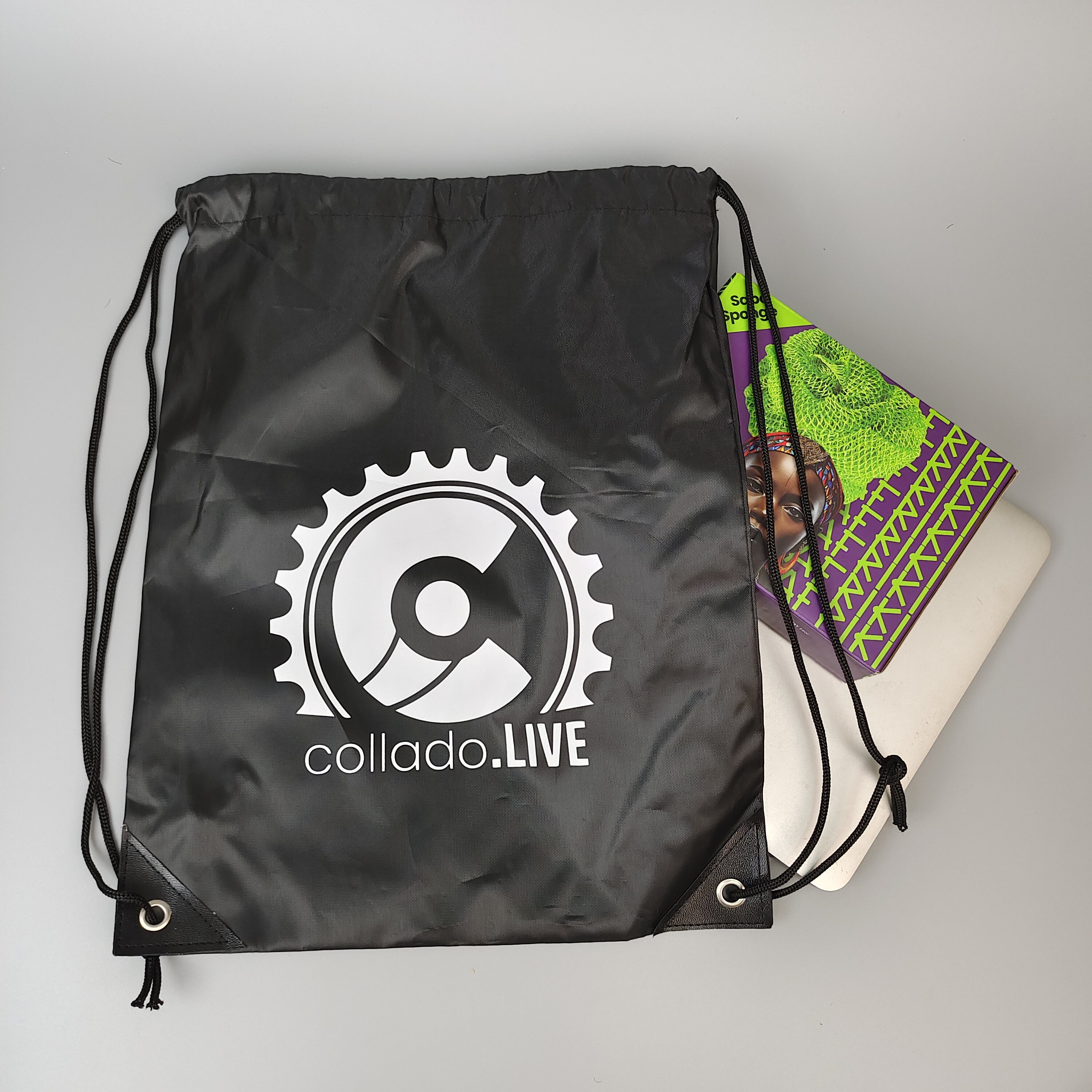black polyester drawstring backpack with centered white emblem - view 3