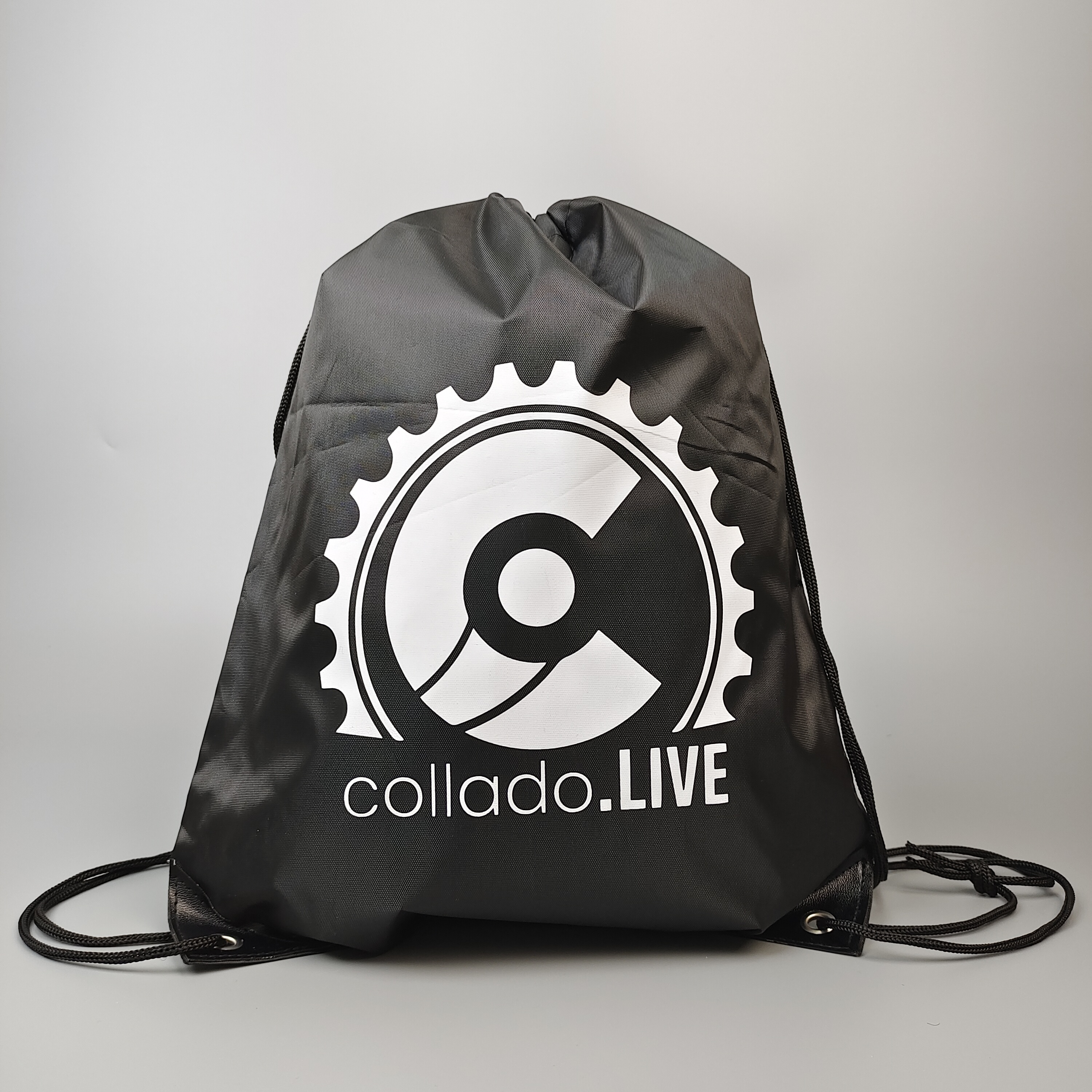 black polyester drawstring backpack with centered white emblem - view 5